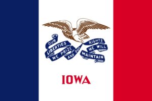 This is the flag of Iowa, depicting an eagle holding a banner that reads, "Our liberties we prize and our rights we will maintain."