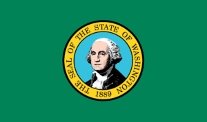 The flag of Washington state, depicting an image of George Washington's face in a yellow circle, with a green background.